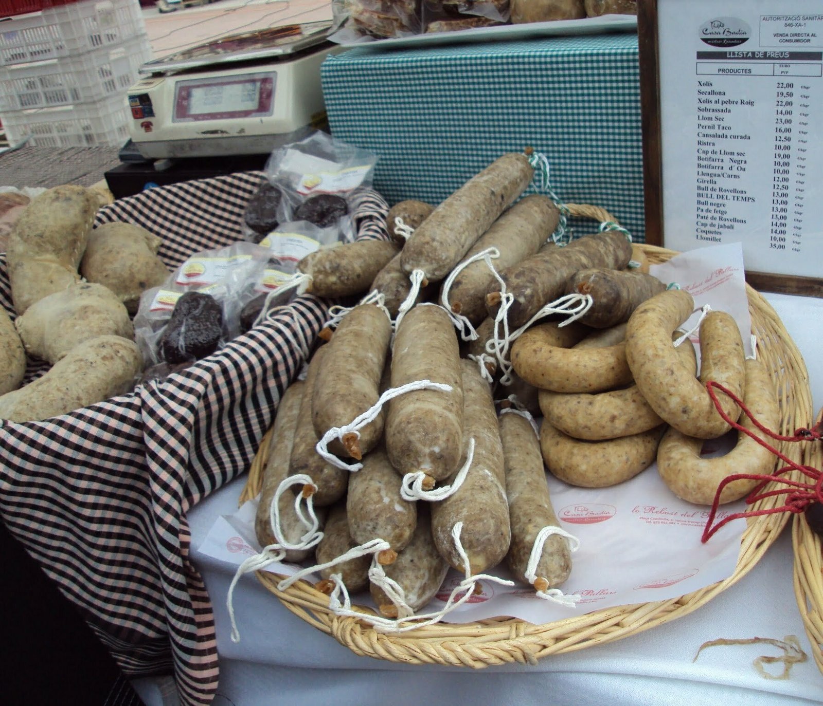 Butifarra sausages sits in a market stall