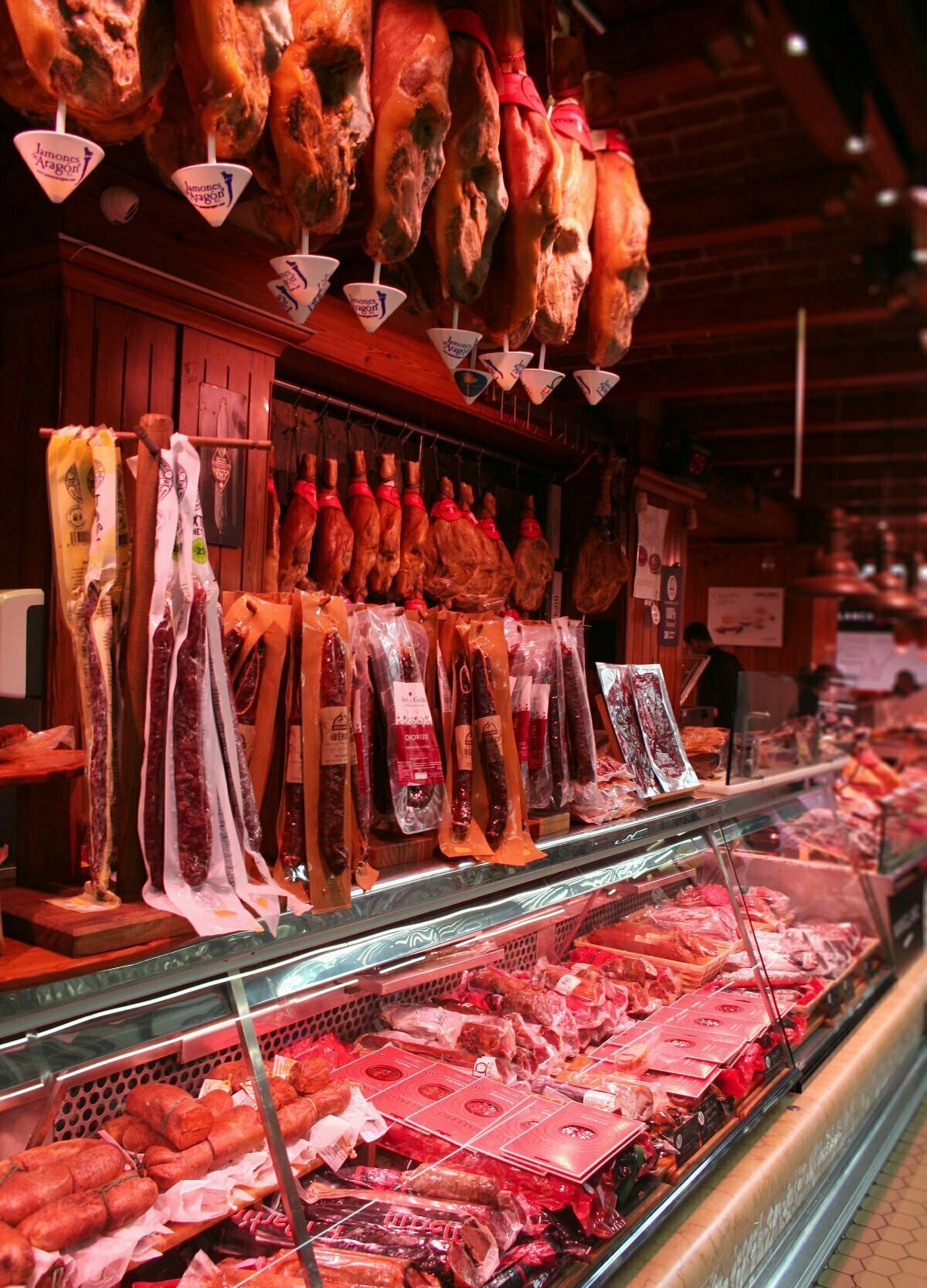 A ham shop inside of the Mercat Central market in Valencia city center