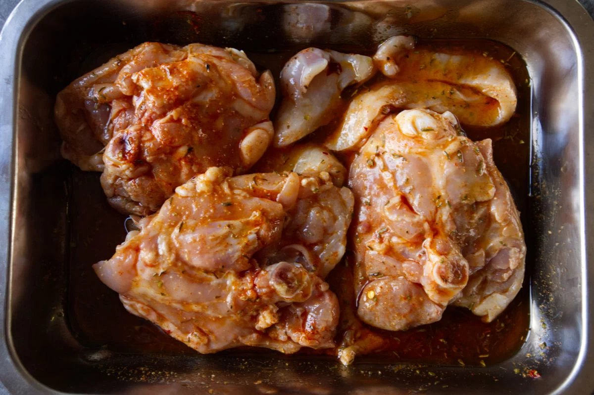 marinated chicken in a tray