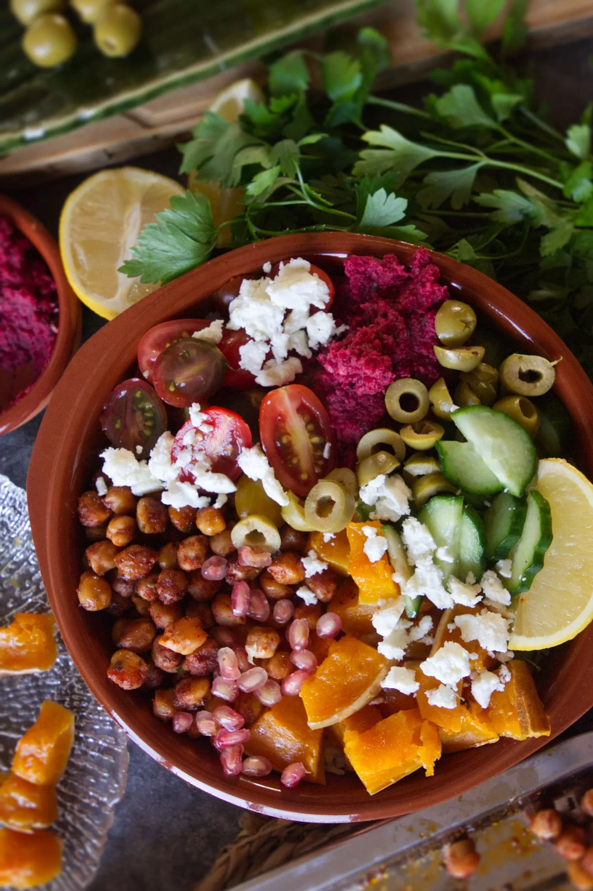 a Mediterranean rice bbowl with lots of salad toppings.