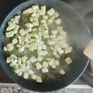 Squid satuees with some garlic and parsley saucce.