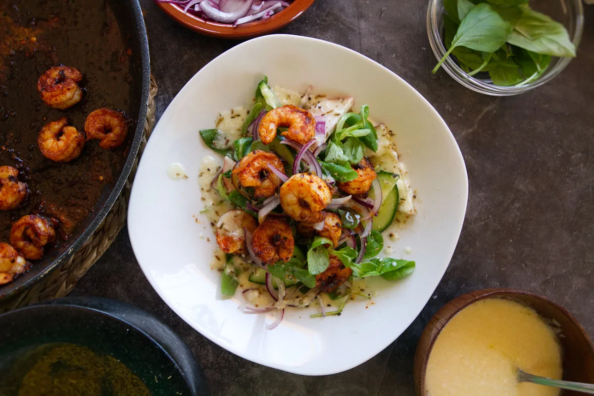 Spicy grilled shrimp with tangy peach salad.