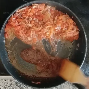 Spices simmer in oil.