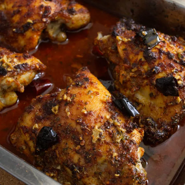 a crispy spanish baked chicken thigh