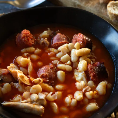 A bowl serving of chicken chorizo dinner.