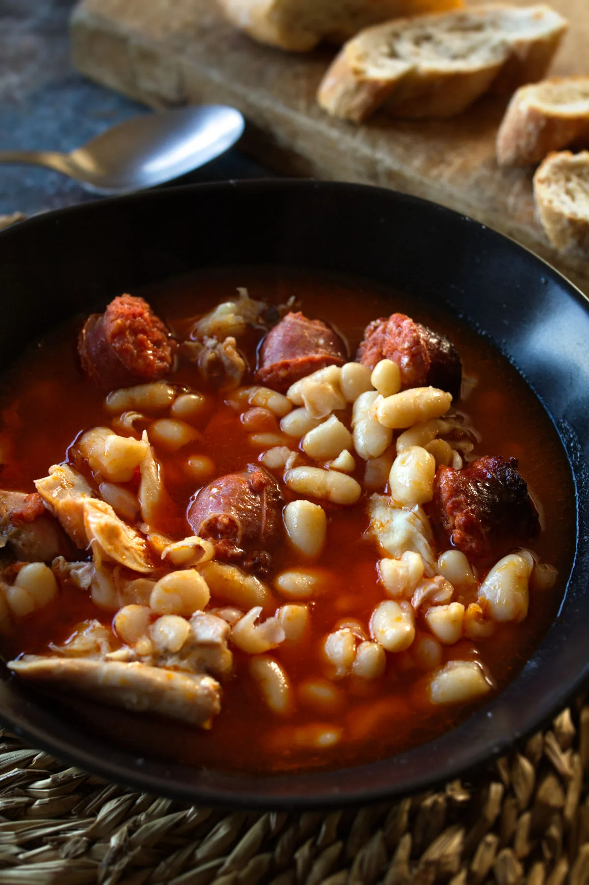 A bowl serving of chicken chorizo dinner.