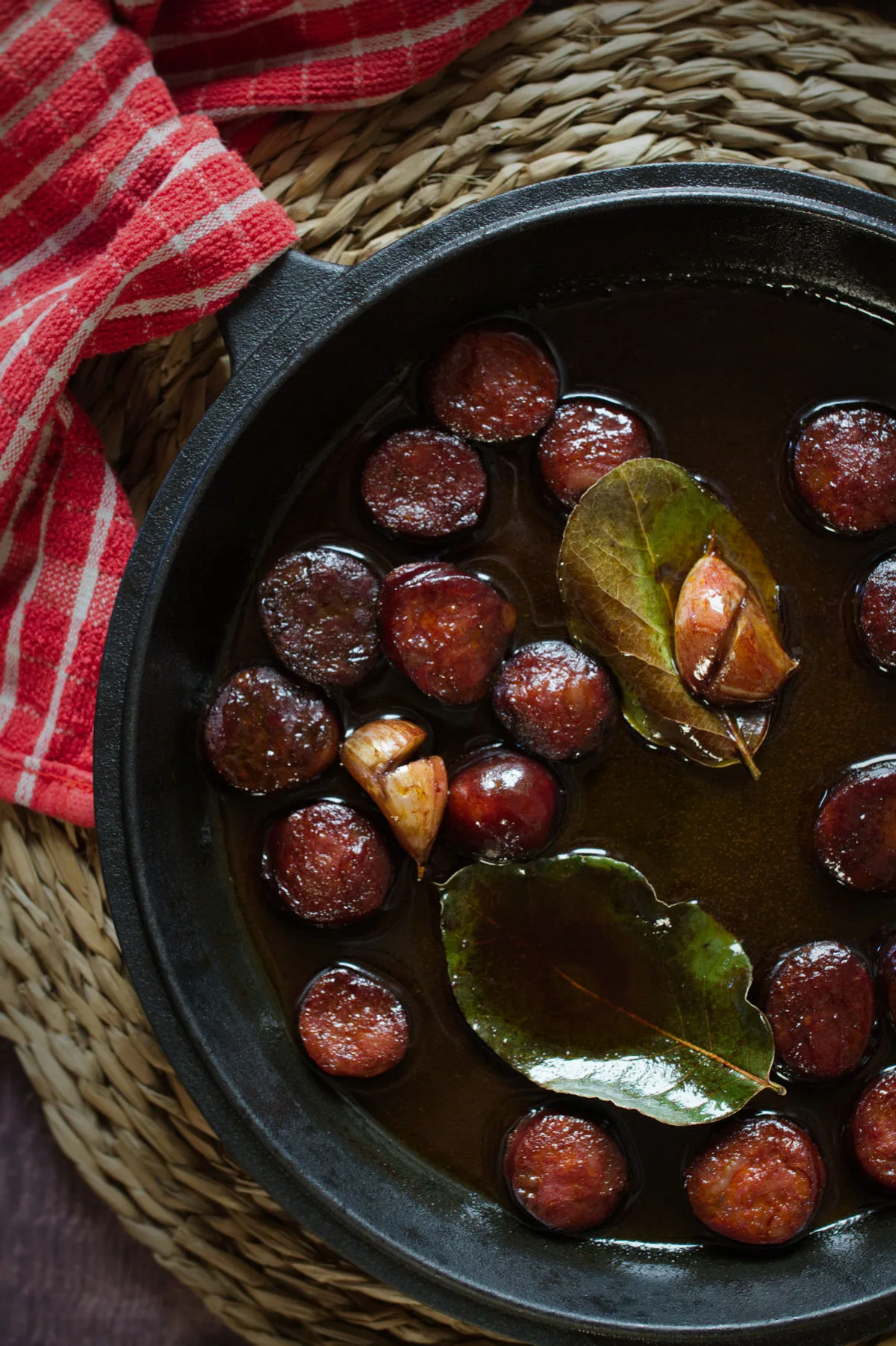 A pan of chorizo in red wine