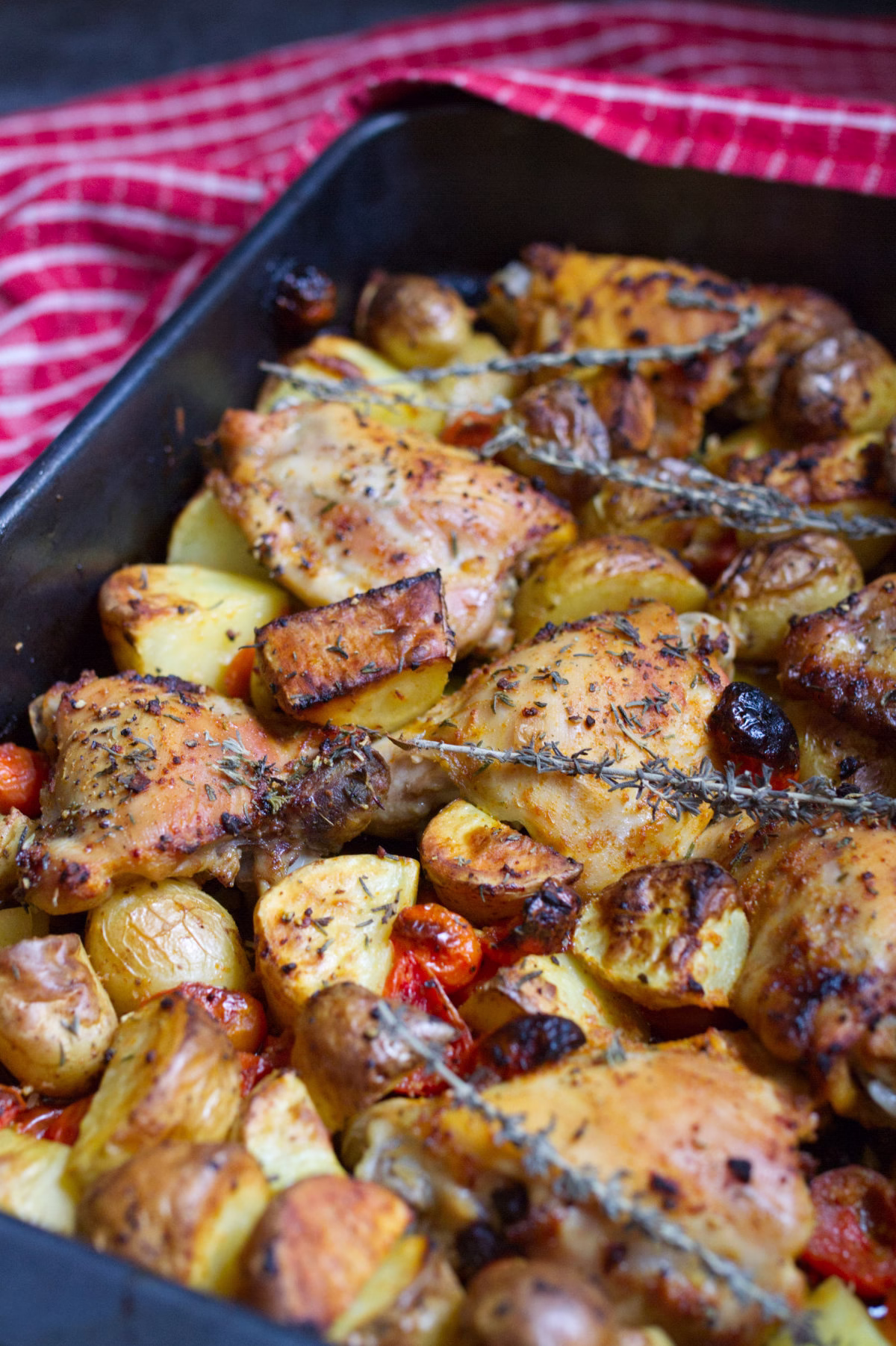 A pan of one-pan chicken and potatoes