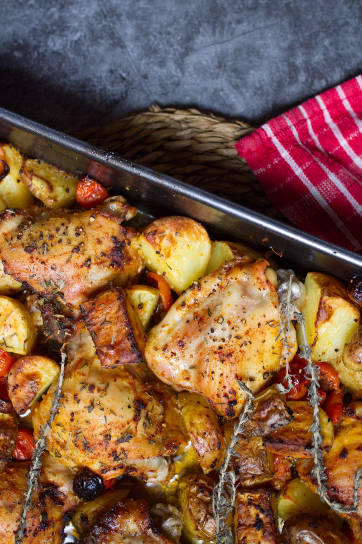A pan of one-pan chicken and potatoes