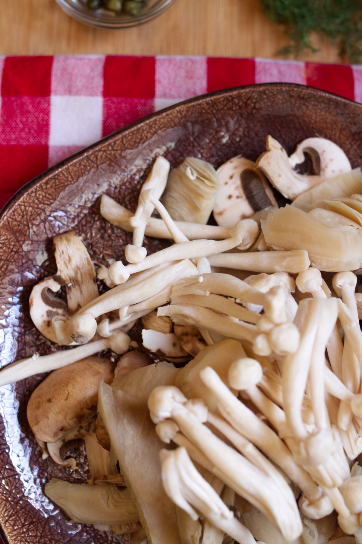 a plate of raw mushrooms