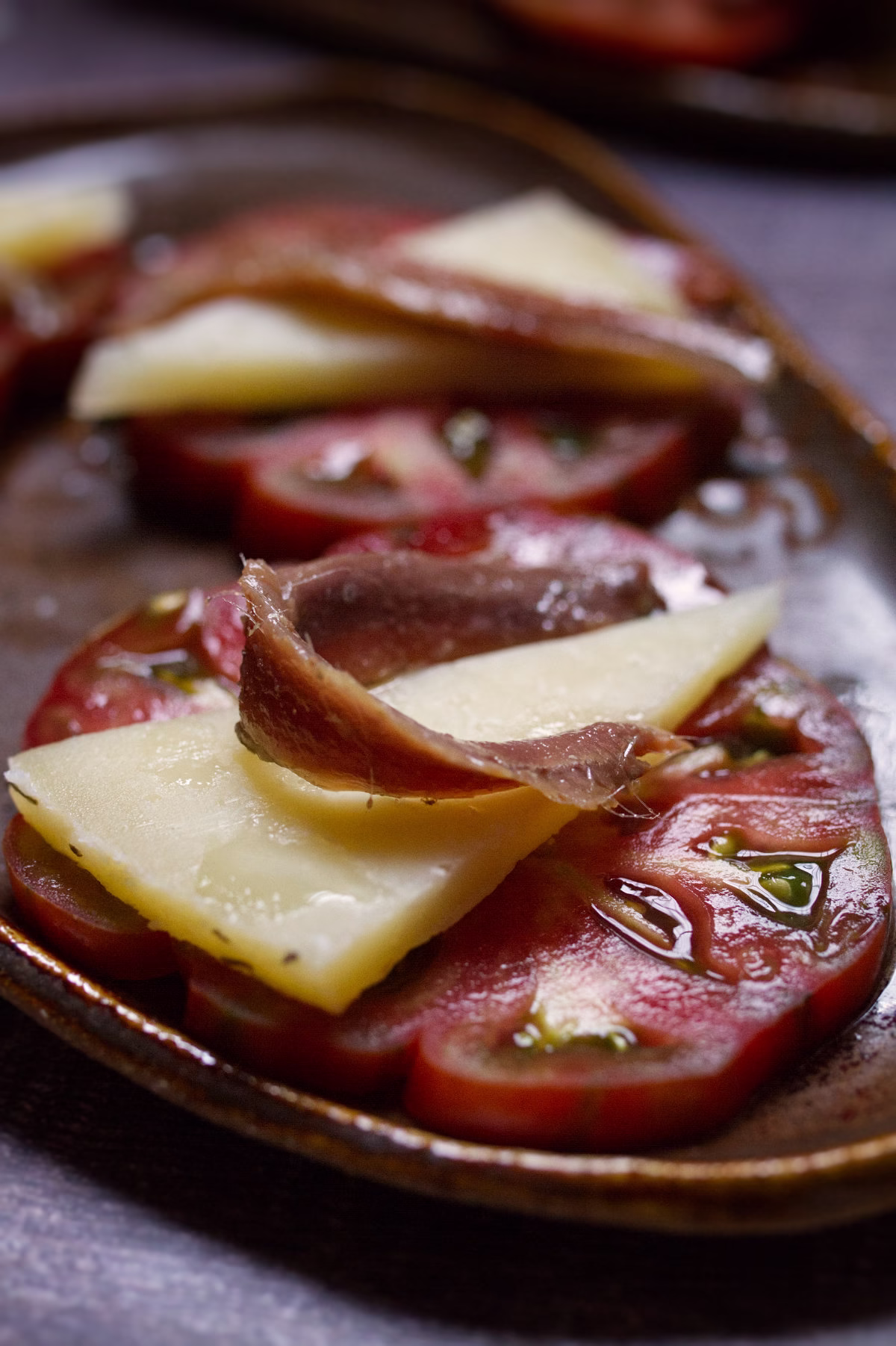 Tomato with manchego and Cantabrian Anchovies