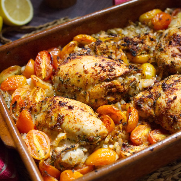 A pan of budget friendly Spanish chicken and veggies