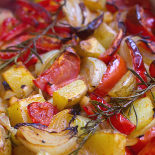 One-Pan Mediterranean Veg-v6 - The Spanish Radish a large baking sheet of roasted Mediterranean vegetables