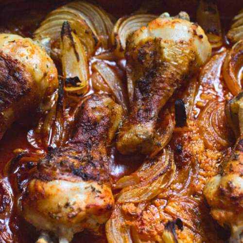 a pan of Spanish Chicken drumsticks