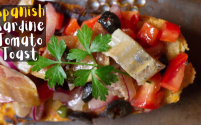 Spanish Sardine toast with tomato, caper, and olive