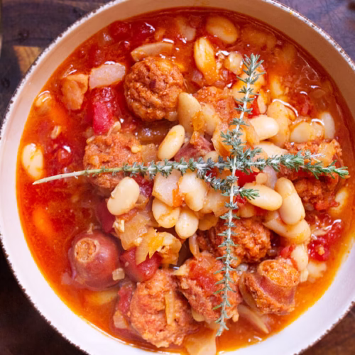Spanish fabada chorizo beans-v19 - The Spanish Radish A bowl of a classic Spanish fabada with chorizo and white beans