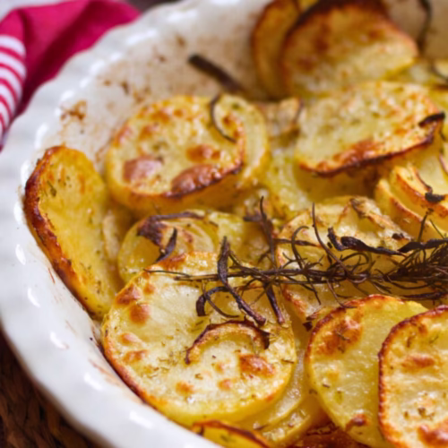 Patatas Panaderas Oven-Roasted Spanish Potatoes - The Spanish Radish A large pan of Patatas panaderas- Spanish potatoes