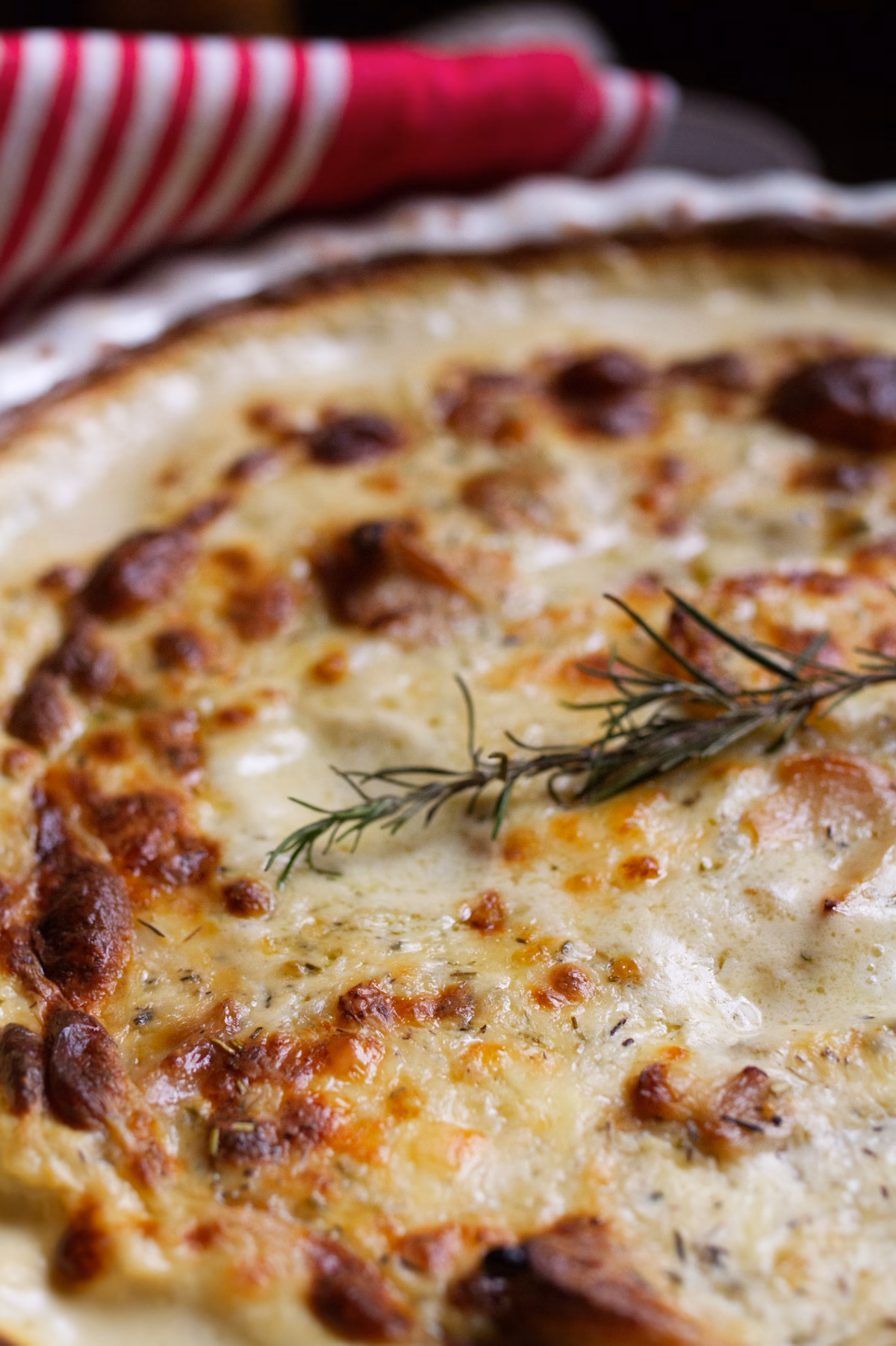 Spanish-Style Potato Gratin-v1 A large dish of Spanish-Style Potato Gratin with Manchego Cheese