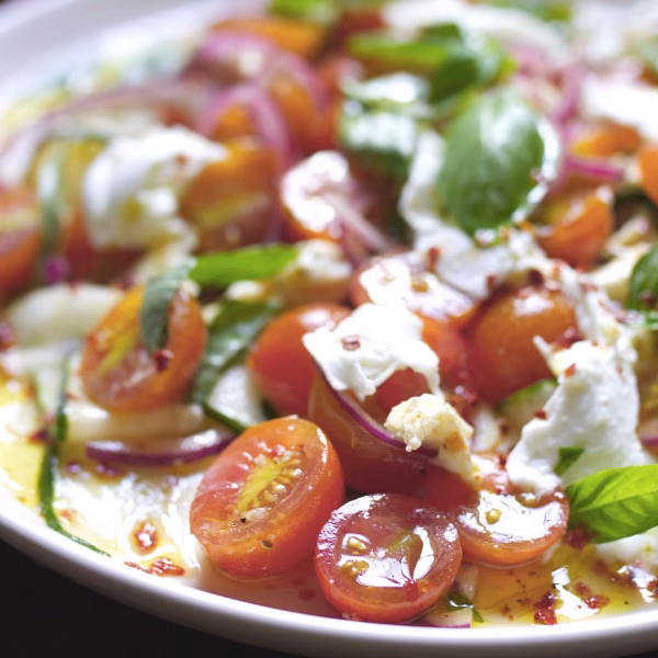 A plate of cherry tomato Mozzarella salad