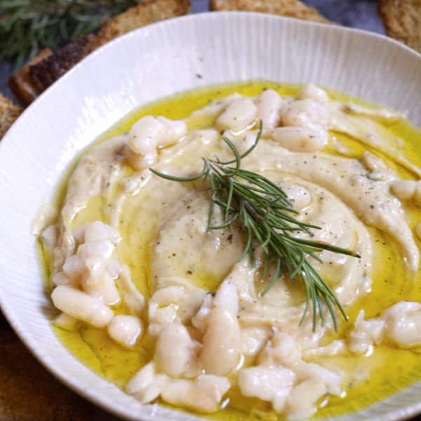 A bowl of Spanish-style white bean dip