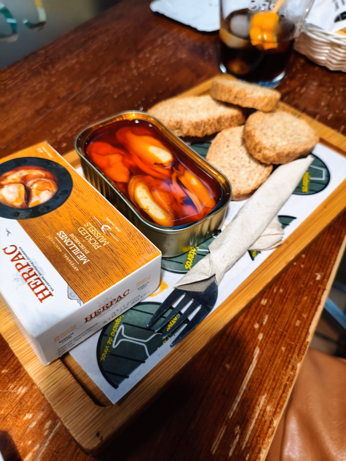 A tapas serving of mussels in an escabeche sauce