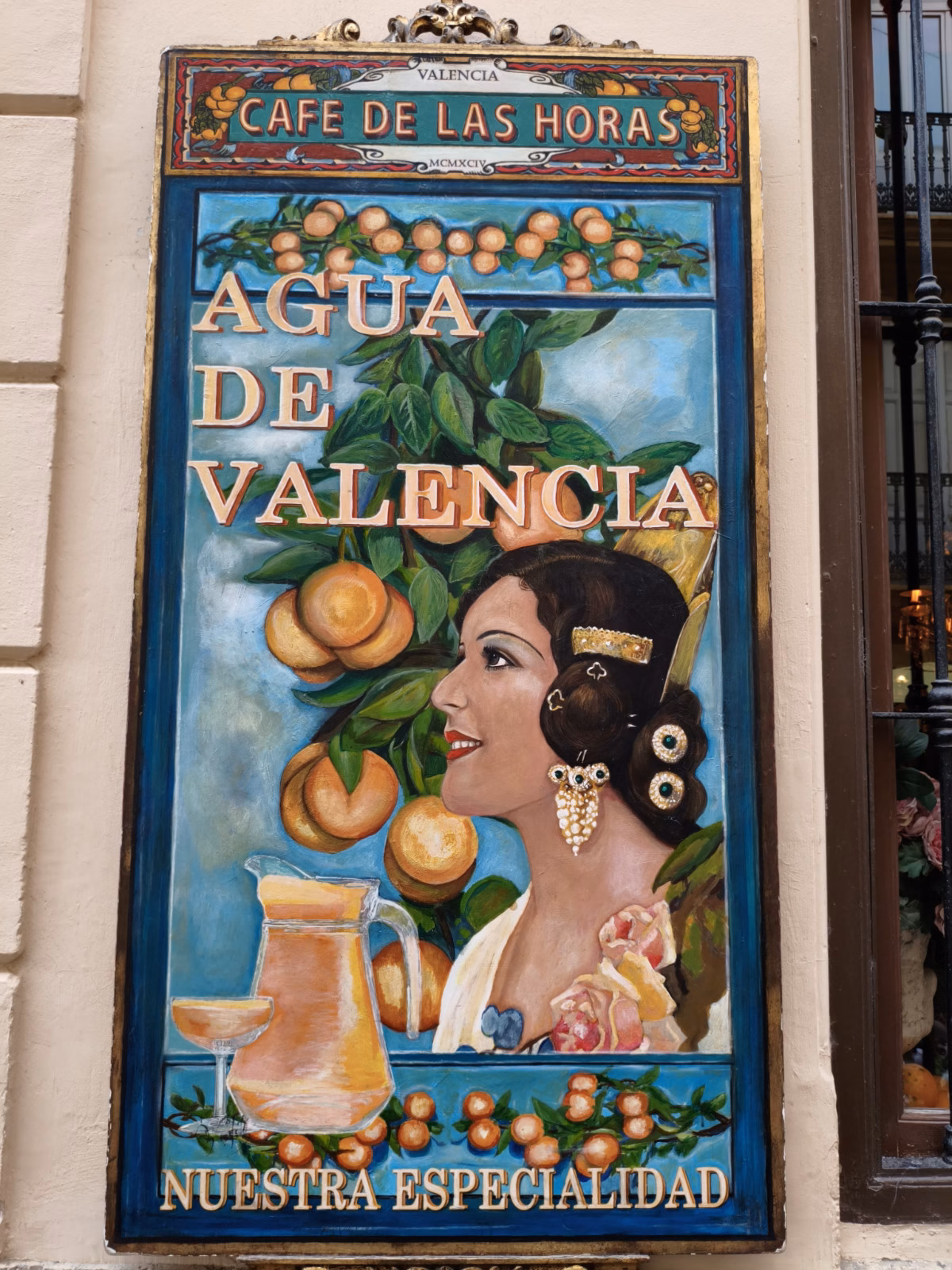 A famous Agua de Valencia sign from Cafe de las Horas