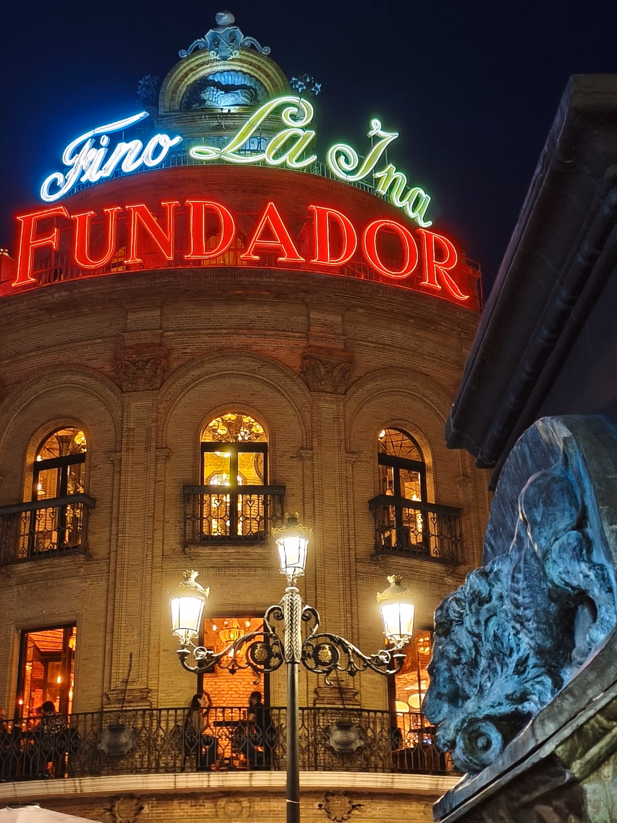 A neon lit building in the historic center of Jerez de la Frontera