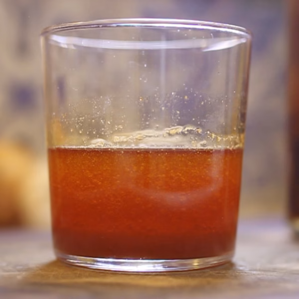 A glass of Spanish Smoked Paprika Vinaigrette
