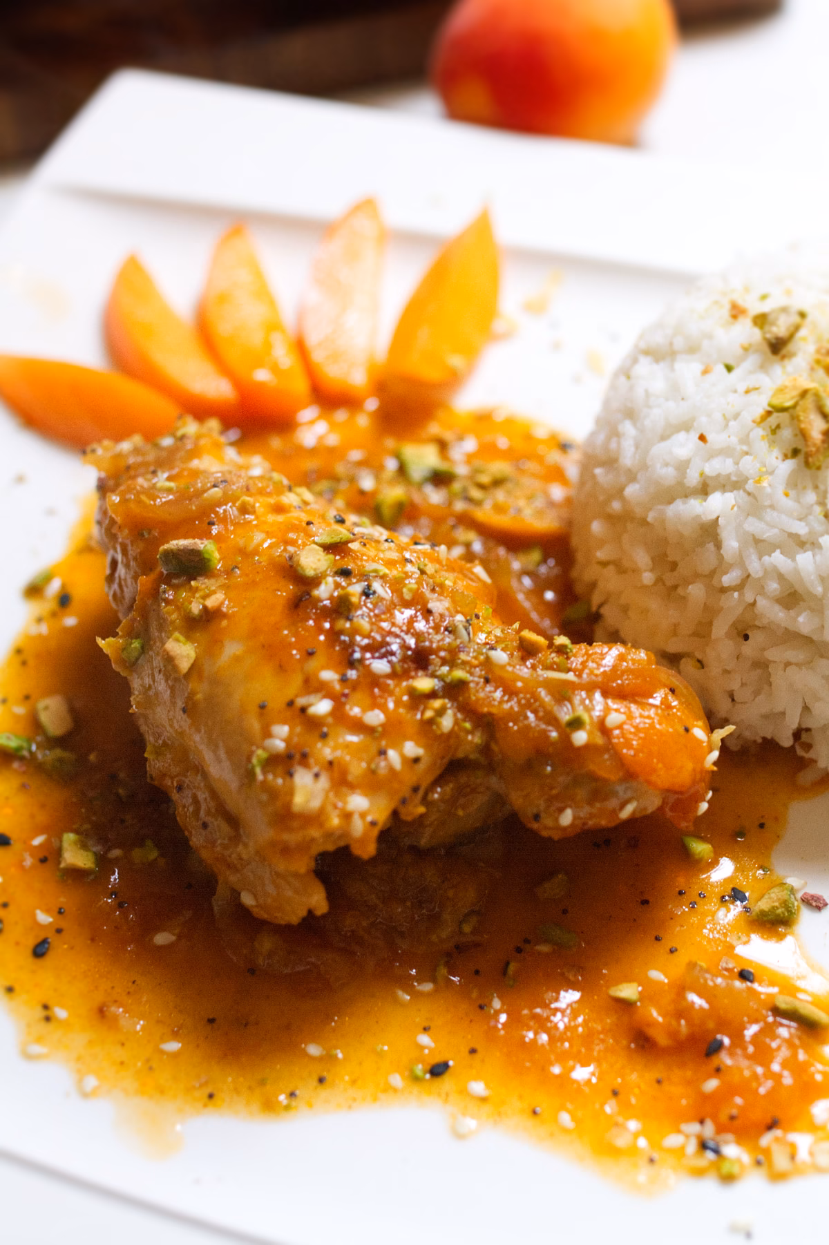 A plate of Spanish-style apricot chicken cooked in Jerez sherry and served with steamed white rice
