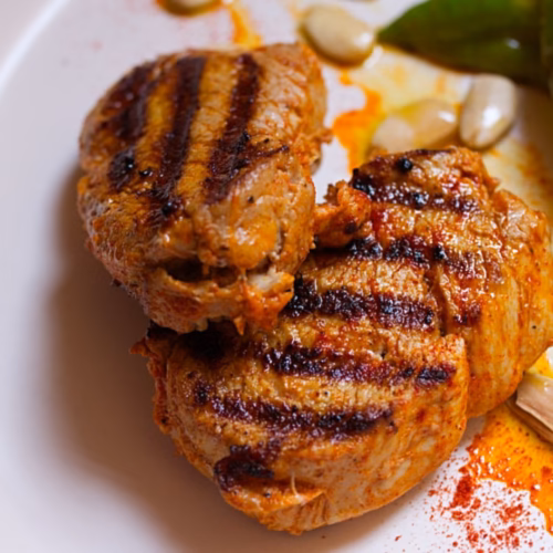 Spanish Pork Tenderloin-5 - The Spanish Radish A serving of Spanish pork tenderloin marinated in a smoked paprika sauce