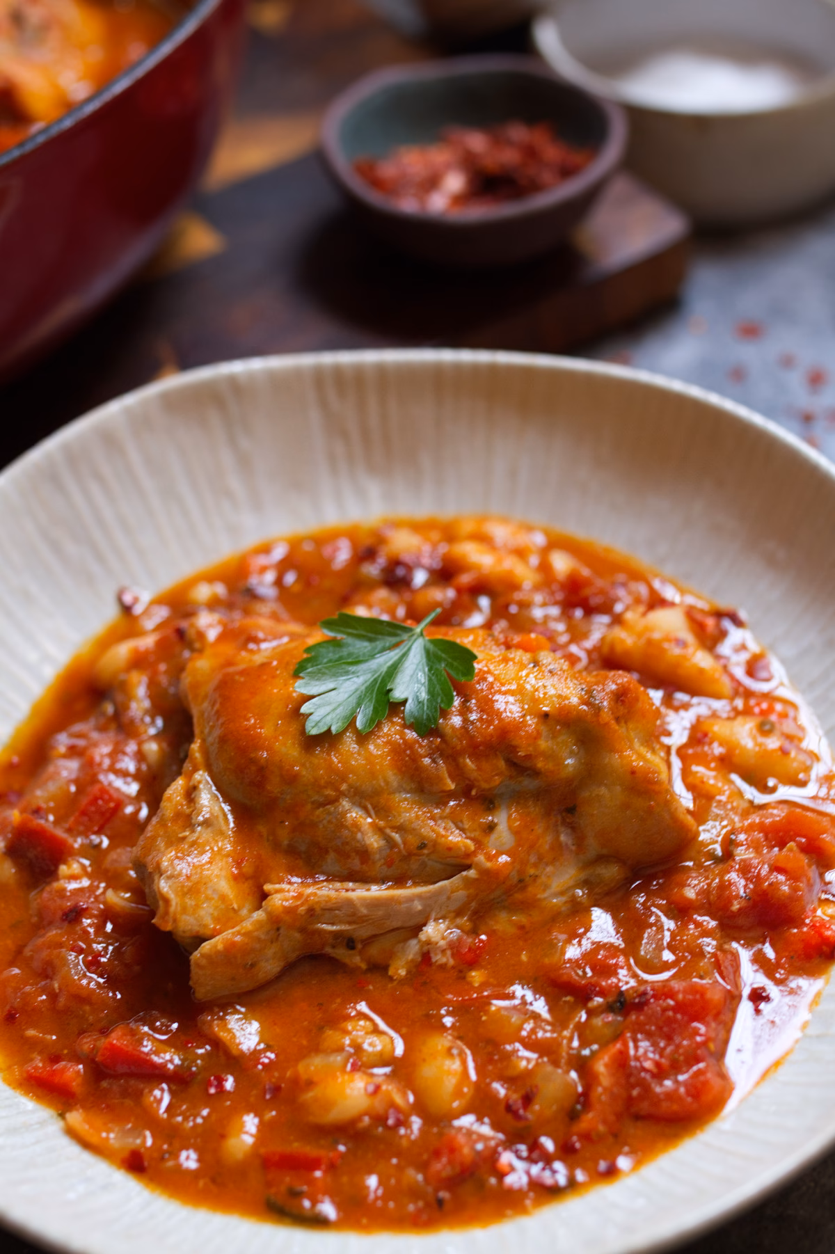 A bowl of Spicy Spanish Chicken Thighs.
