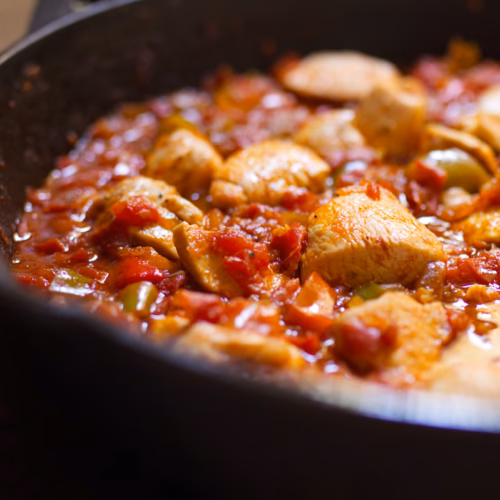 Spanish Chicken with Tomato Sauce-v3 - The Spanish Radish A large pan of Spanish chicken with tomato sauce