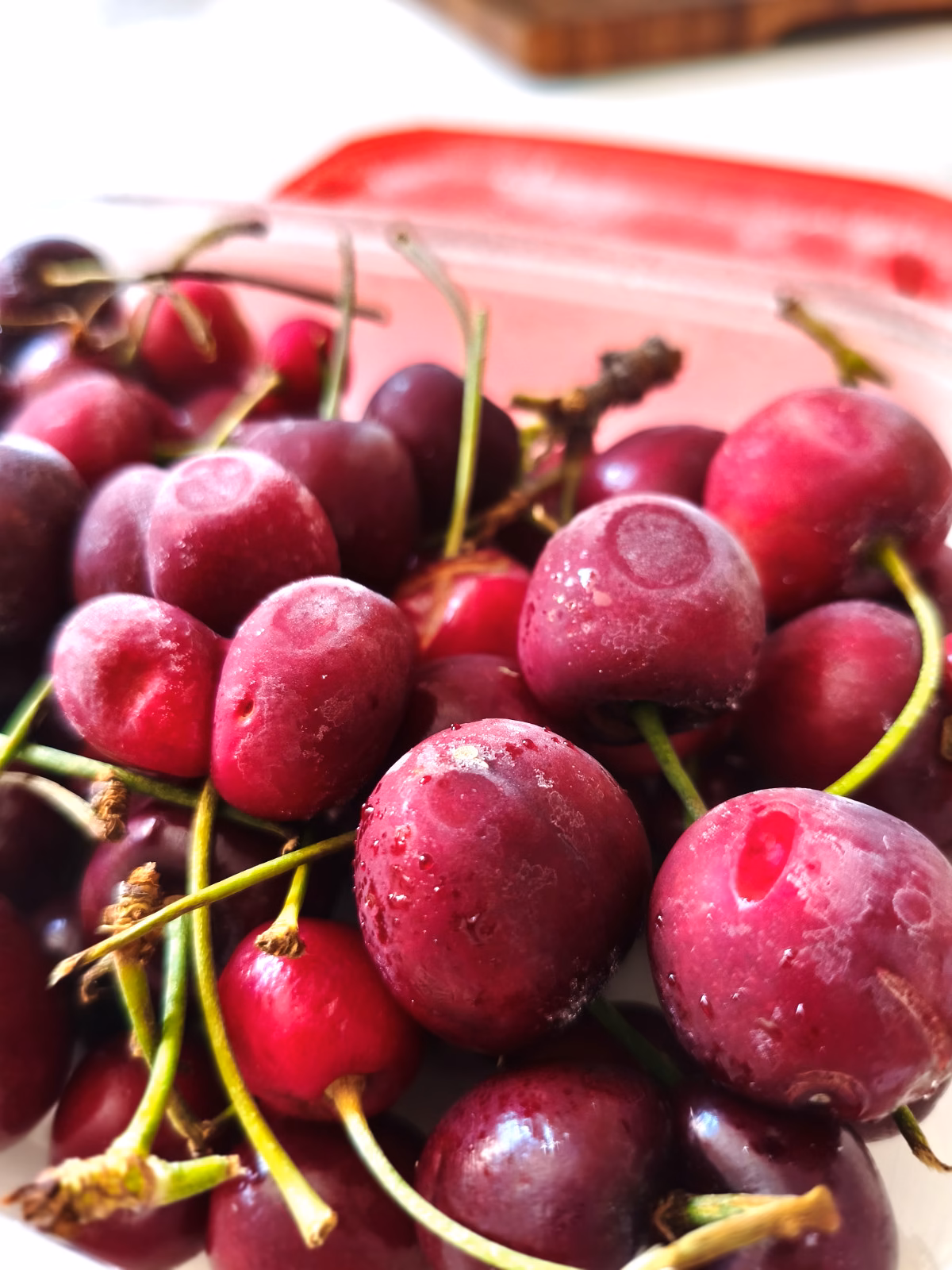 a container of frozen cherries