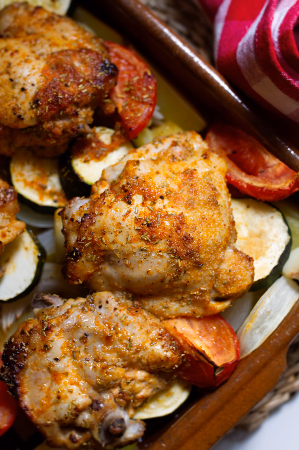 A tray of Roasted Chicken Thighs and Mediterranean Veg