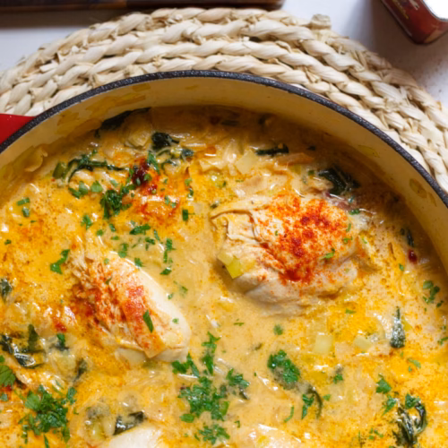 A large pan of creamy chicken and leek stew