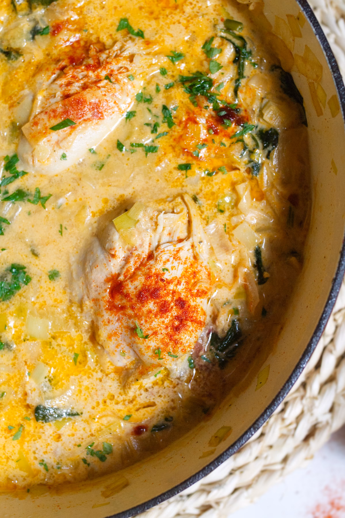 A large pan of creamy chicken and leek stew